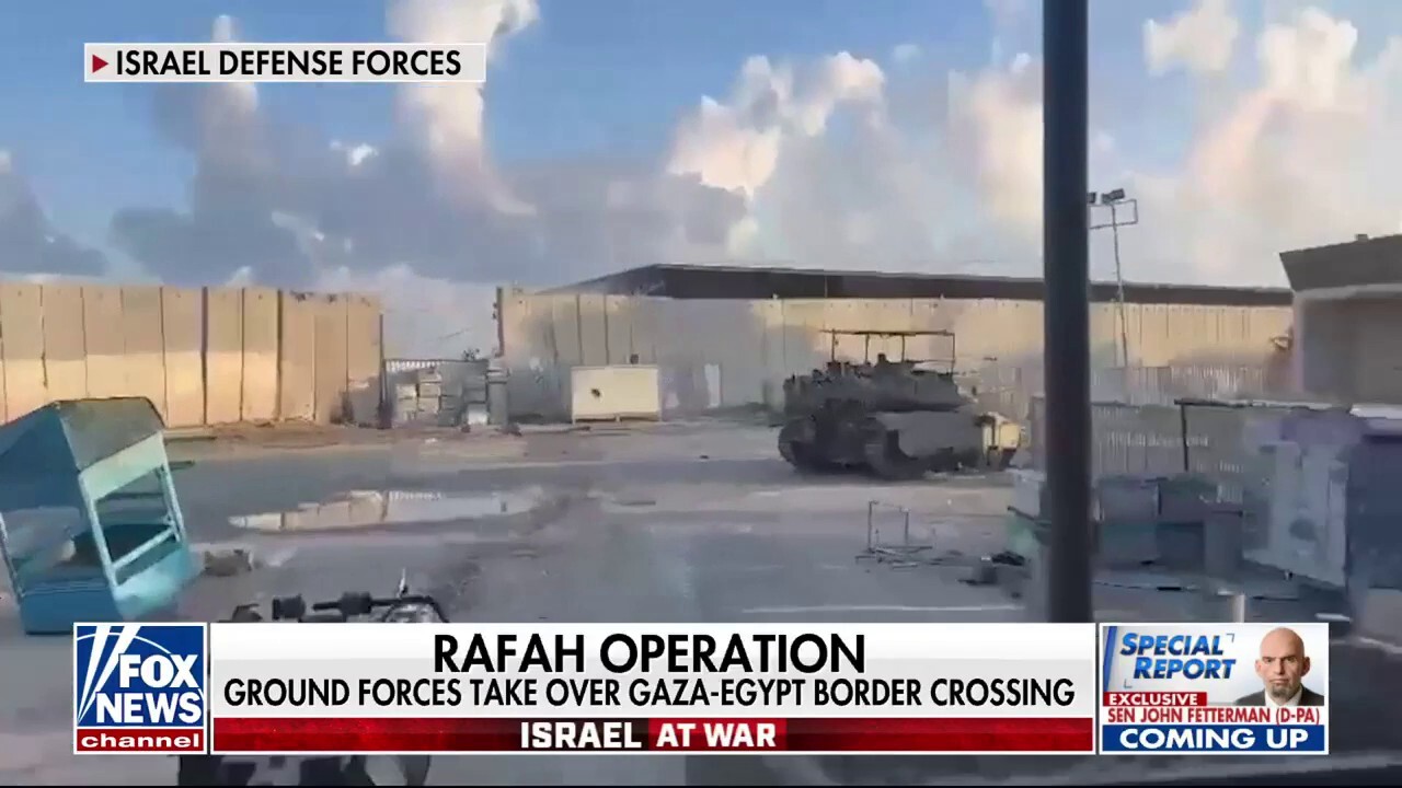 Israeli tanks roll into Rafah as ground forces take control of border crossing