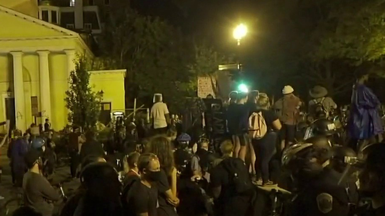 Trump orders arrests for monument vandalism as protesters try to topple Andrew Jackson statue near White House