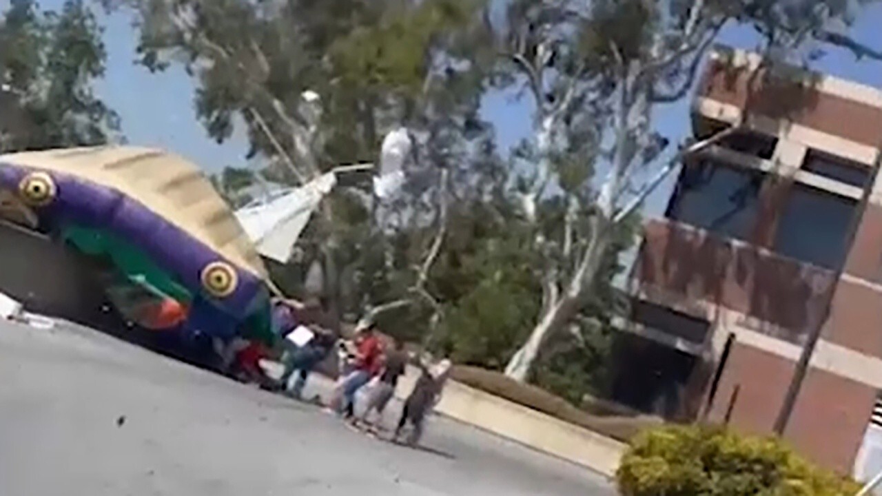 California sheriff's helicopter lifts bounce house into air, injuring 3 children