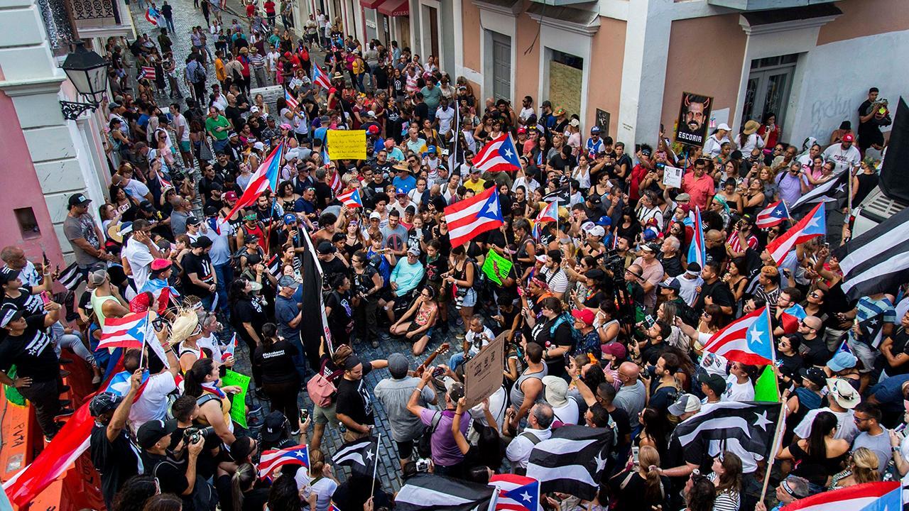 Puerto Rico could see largest demonstration in history as governor fights resignation calls