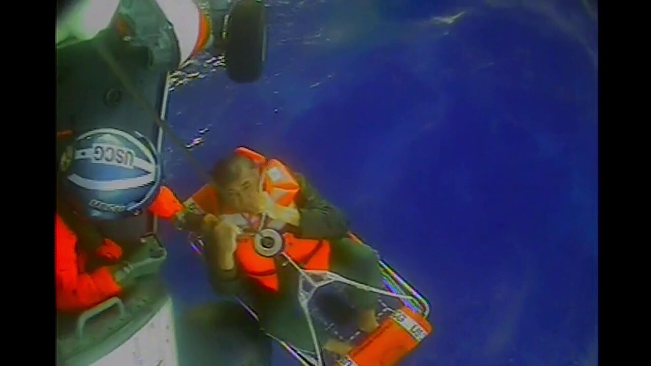 Coast Guard rescues four sailors from capsized catamaran