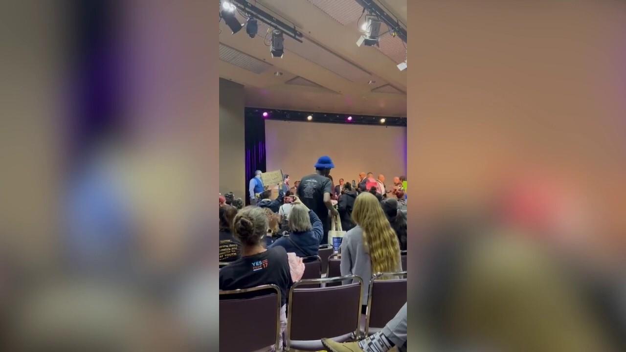 San Francisco DA walks out of debate as protesters chant 'no justice, no peace'