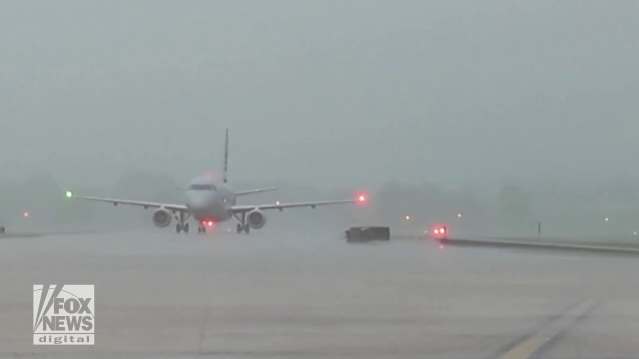Lightning strikes airplane on tarmac in shocking video