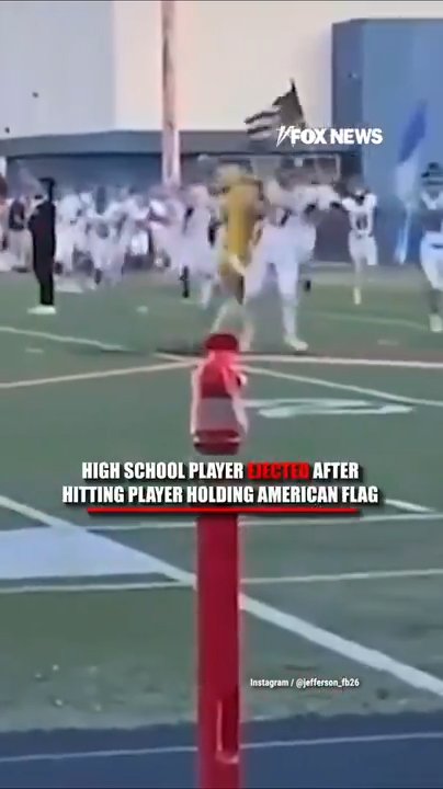 WATCH: High school football player EJECTED after hitting player holding American flag