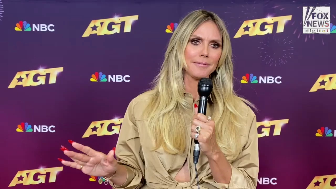 ‘AGT’ judge Heidi Klum reacts to Simon Cowell’s attempt to steal Howie Mandel’s Golden Buzzer