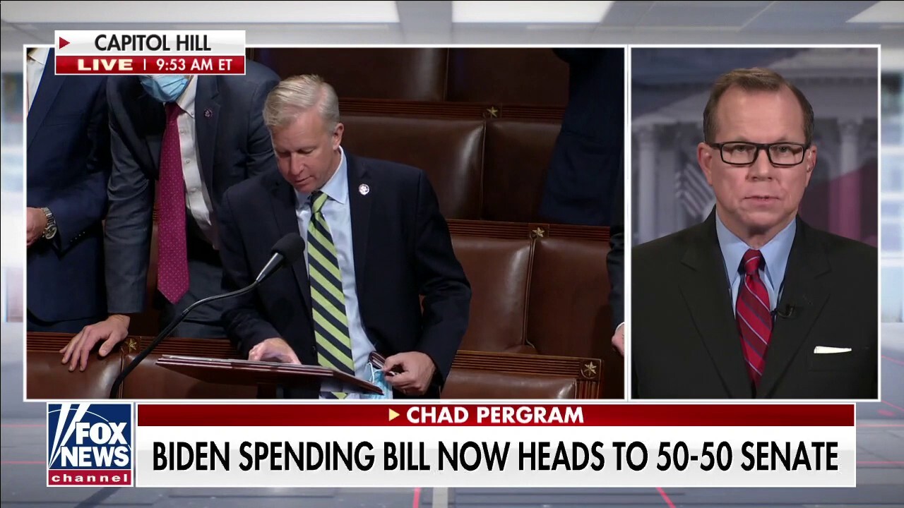 House narrowly passes Biden's massive spending bill