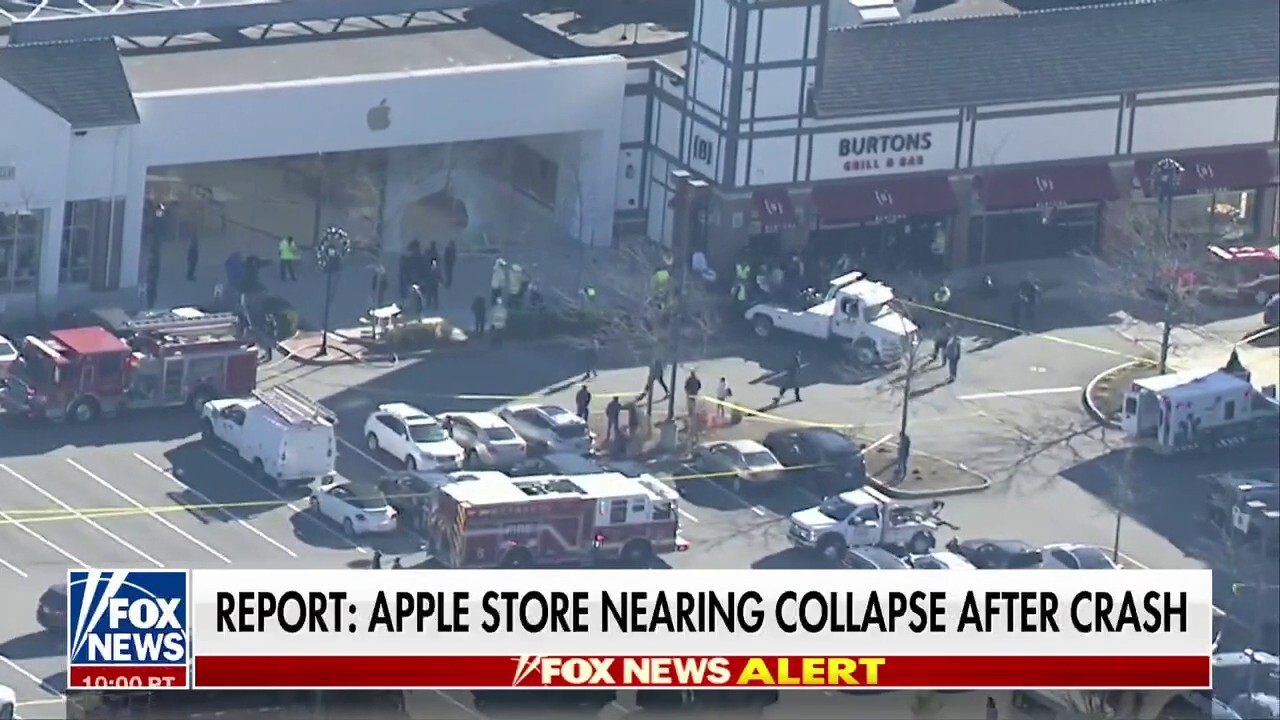 Driver charged in deadly Apple store crash said his foot got stuck
