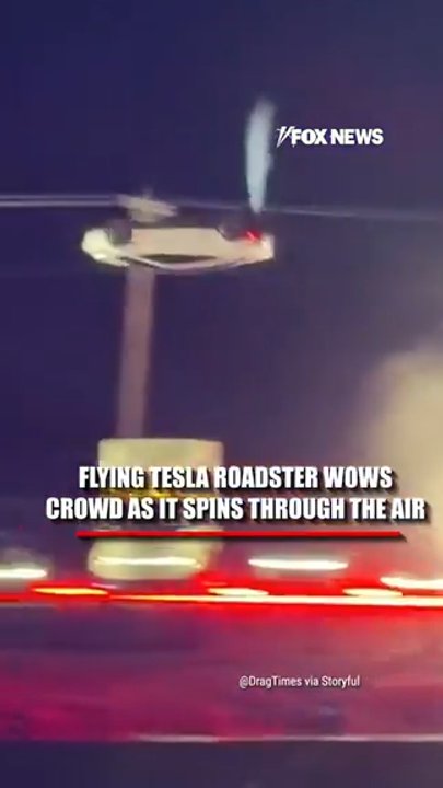 WATCH: Flying Tesla Roadster wows crowd as it spins through air