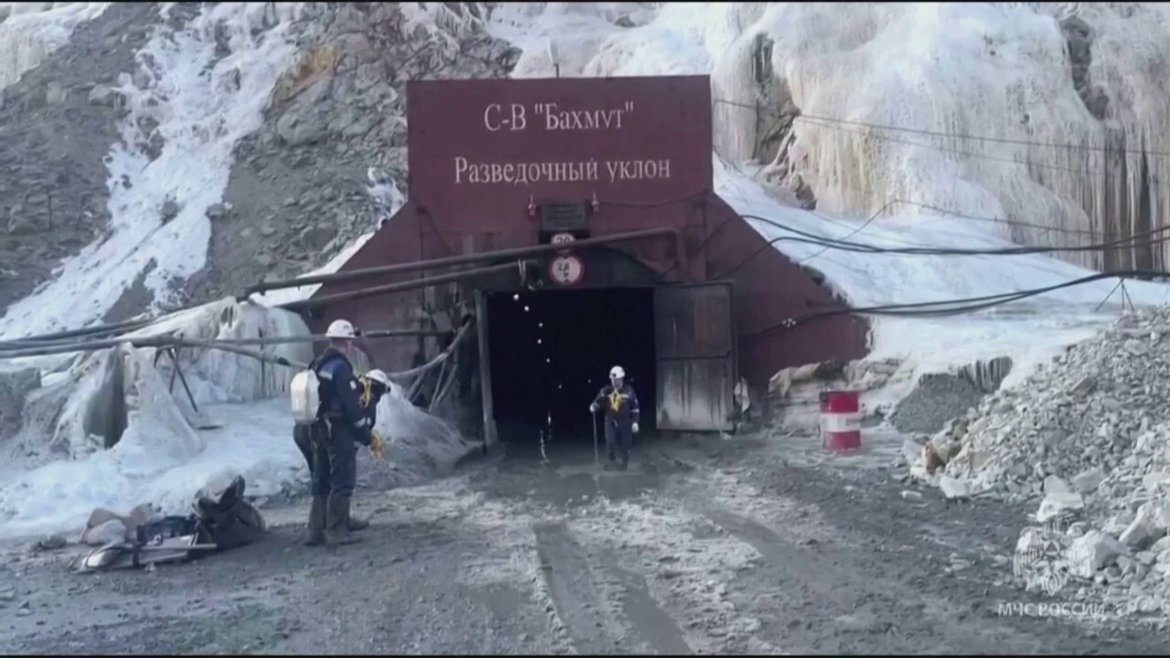 Rescuers race to save 13 miners trapped in Russian gold mine