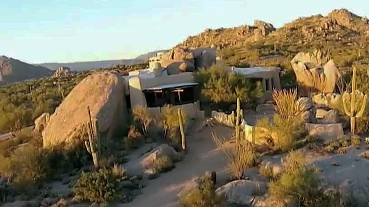 Home built inside boulders takes desert living to new level