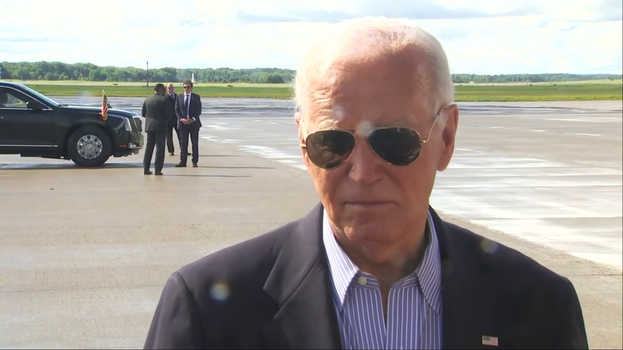 Biden says at least 20 members of Congress told him to stay in presidential race