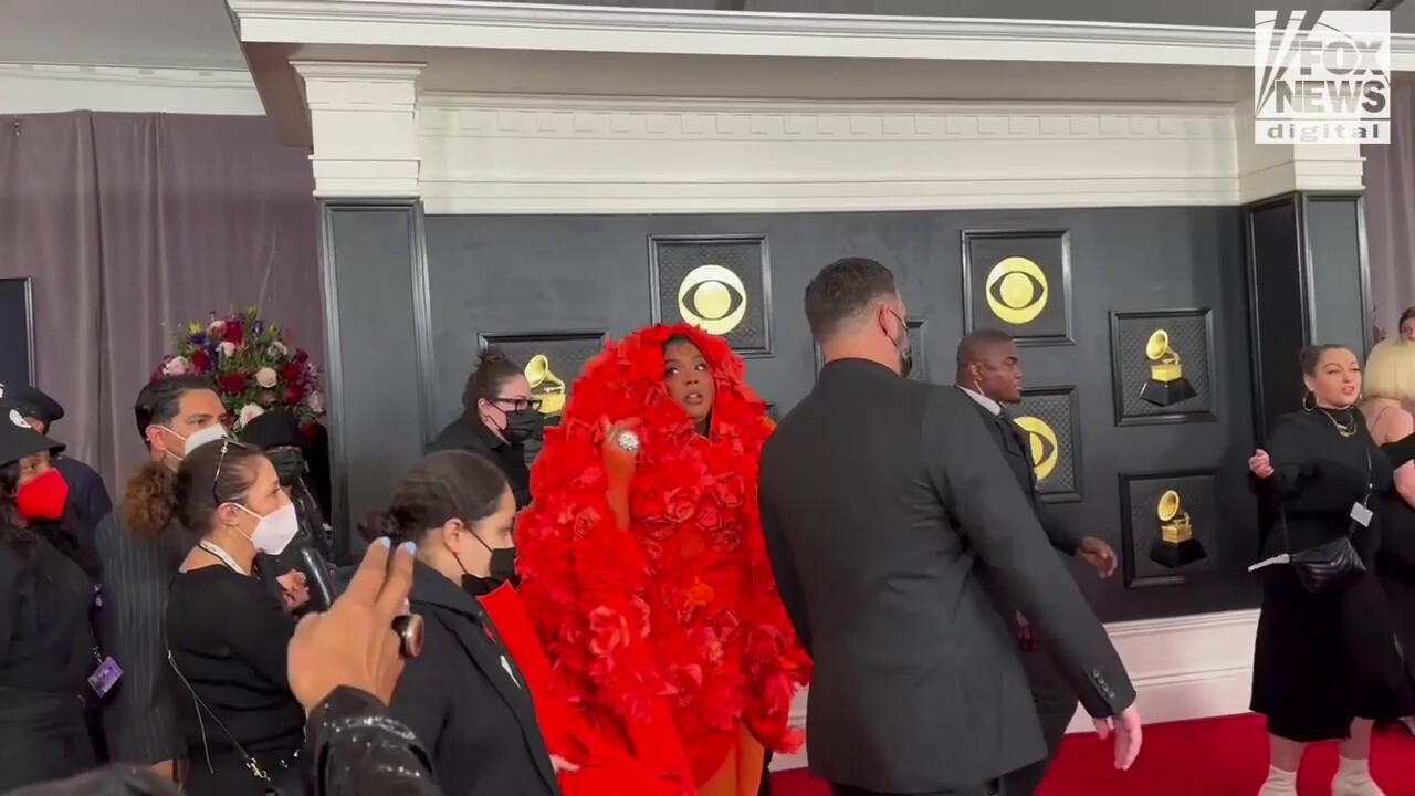 Lizzo walks the red carpet at the 2023 Grammy Awards