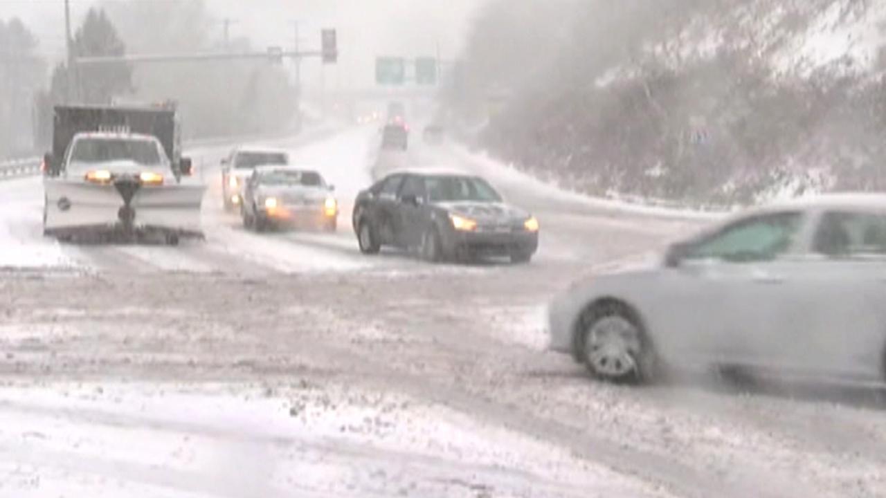 Early season snowstorm causes commuter chaos on East Coast