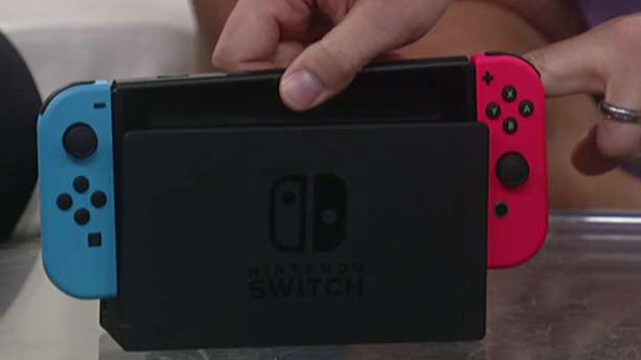 Nintendo executive demonstrates the Nintendo Switch 