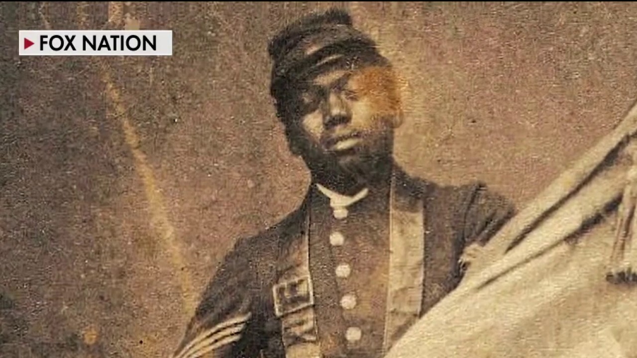 ‘Guarding Old Glory’ honors first black Medal of Honor recipient