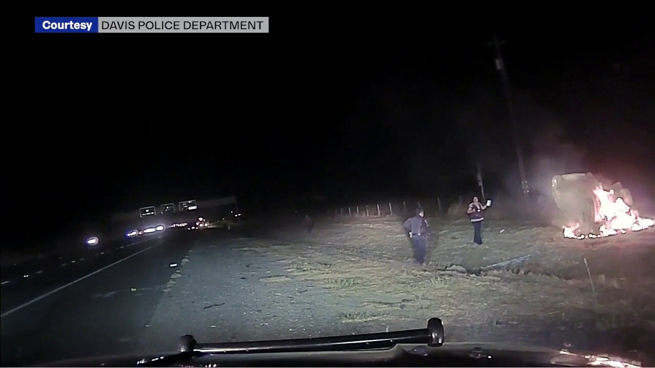 California cop's bodycam footage shows rescue of woman from burning car