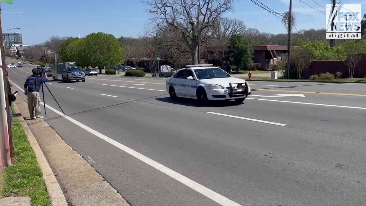 Police cordon off an area after reports of a shooting at The Covenant School