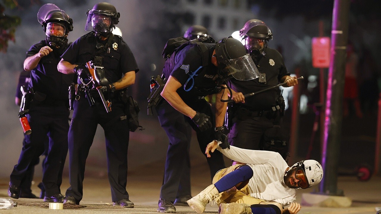 Police clash with George Floyd protesters in demonstrations across America