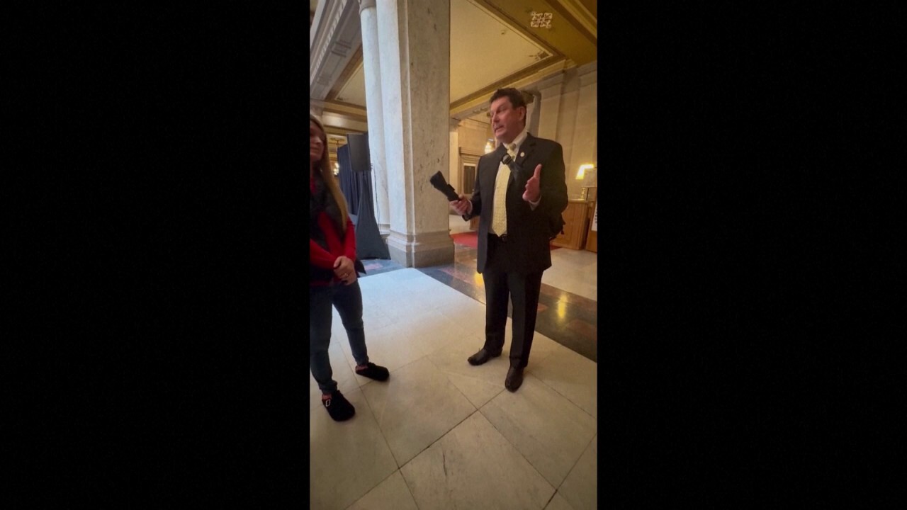 Indiana state Rep. Jim Lucas flashes firearm to pro-gun control students