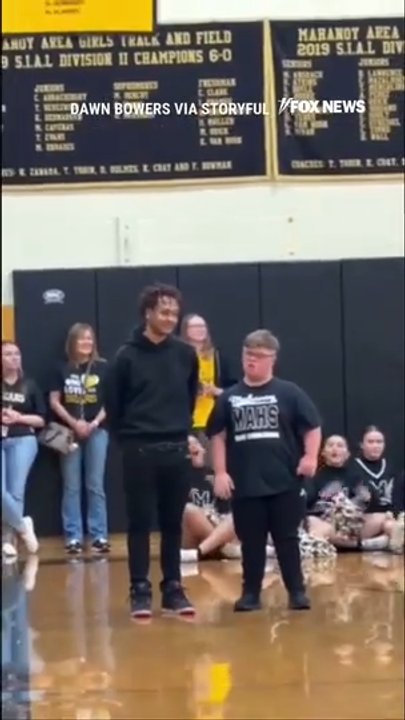 Homecoming king gives crown to classmate with Down syndrome