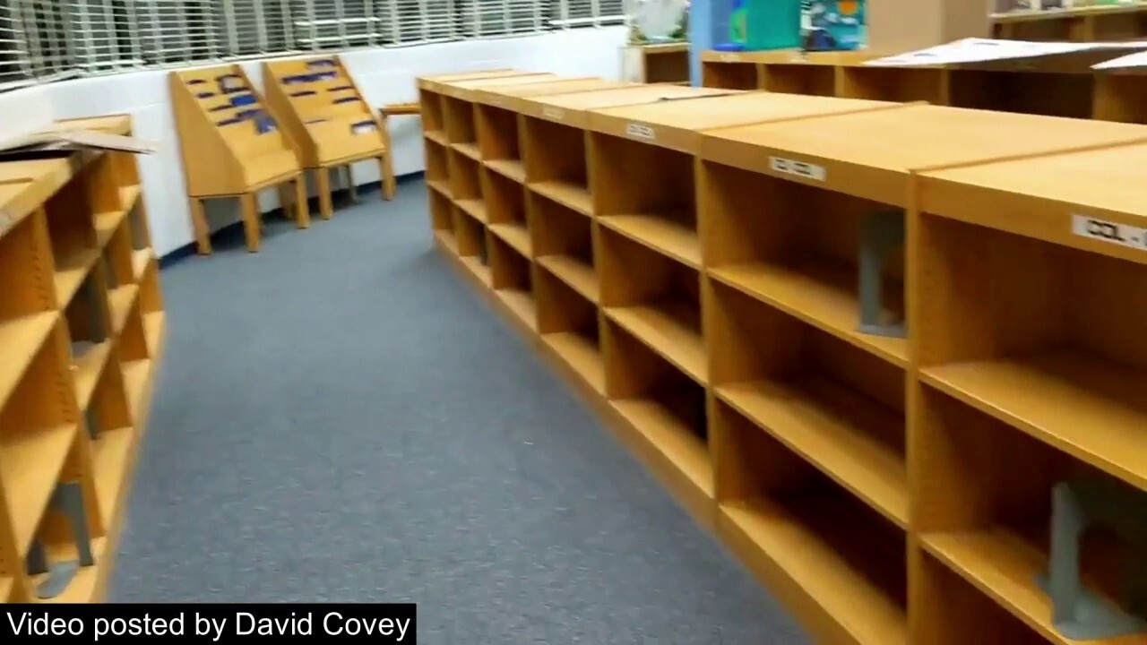 Video Showing Empty Bookshelves In Florida Library And Counter video 