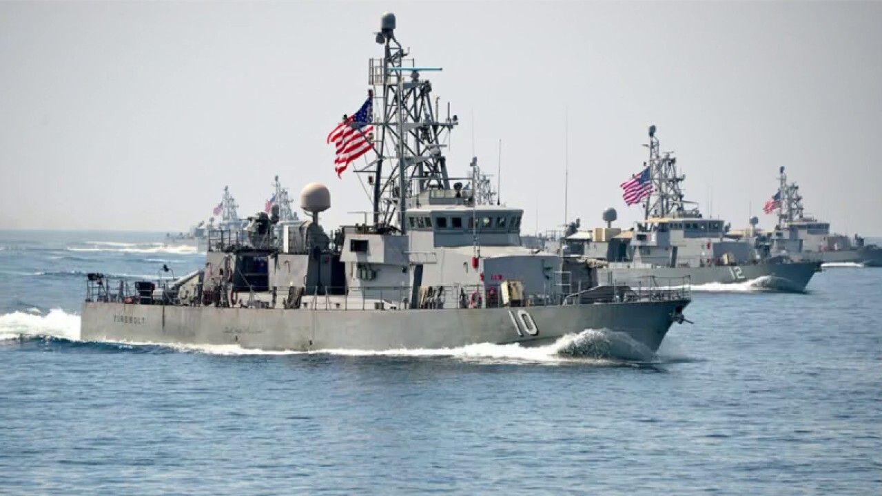 US Navy fires warning shots at three Iranian vessels