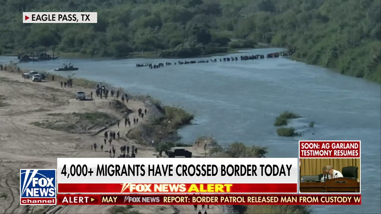 Over 4,000 migrants cross US border in one morning