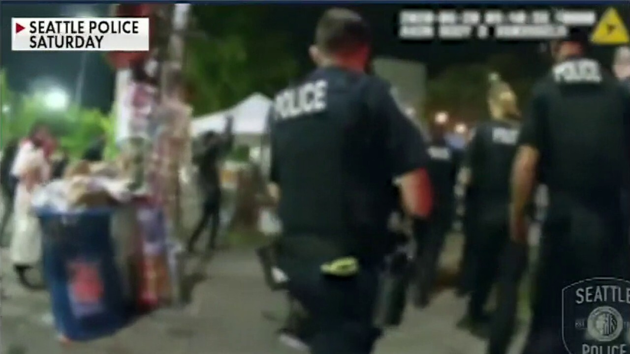 Seattle police officers confronted by protesters when responding to shooting inside 'CHOP' zone