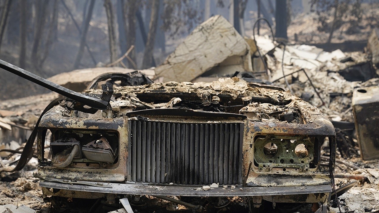 California residents return home to assess wildfire damage