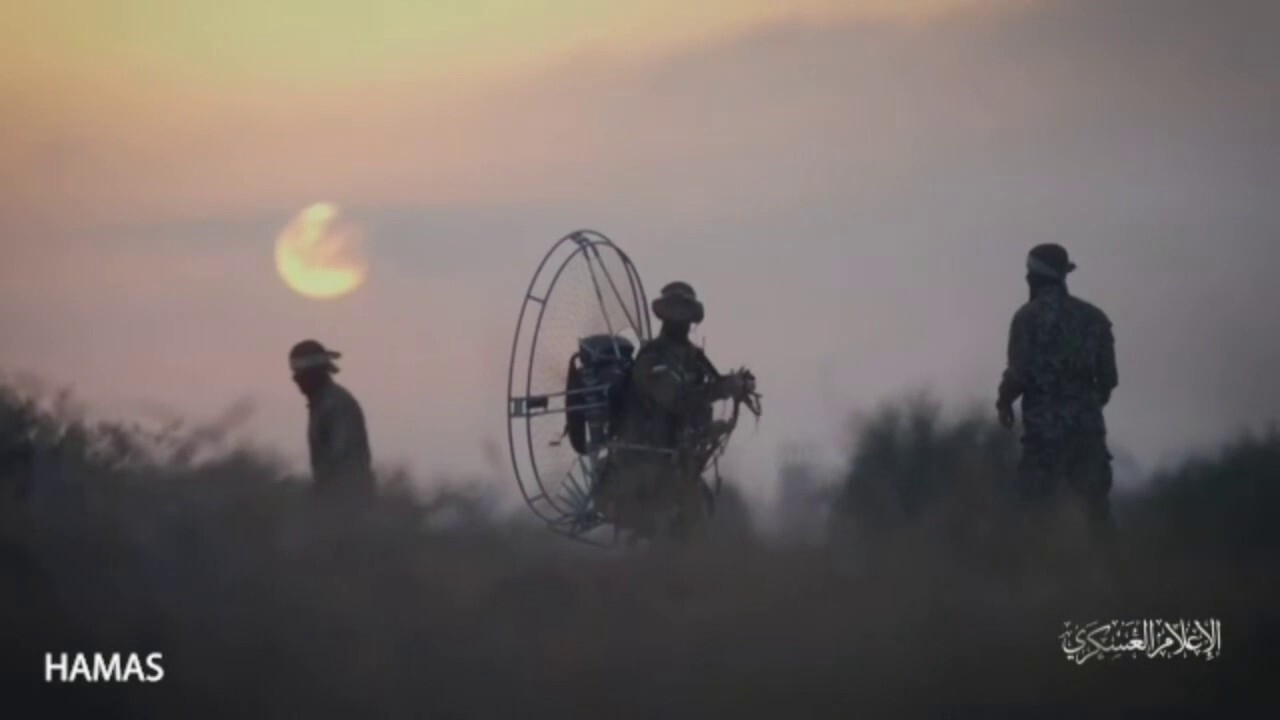 Video purports to show Hamas terrorists paragliding into Israel