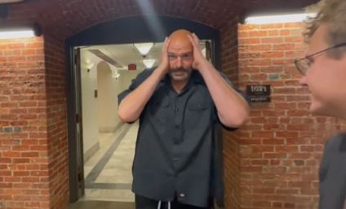 John Fetterman gives odd, animated reaction to news of Biden impeachment inquiry
