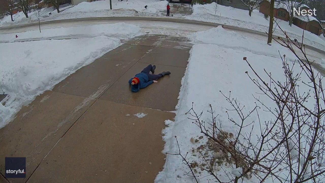 Dad slips on icy driveway as toddler tells him to take ‘little steps’