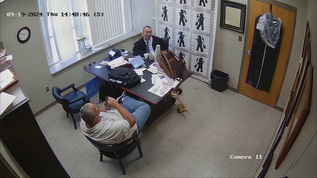 Surveillance footage shows phone exchange between sheriff and judge moments before fatal shooting