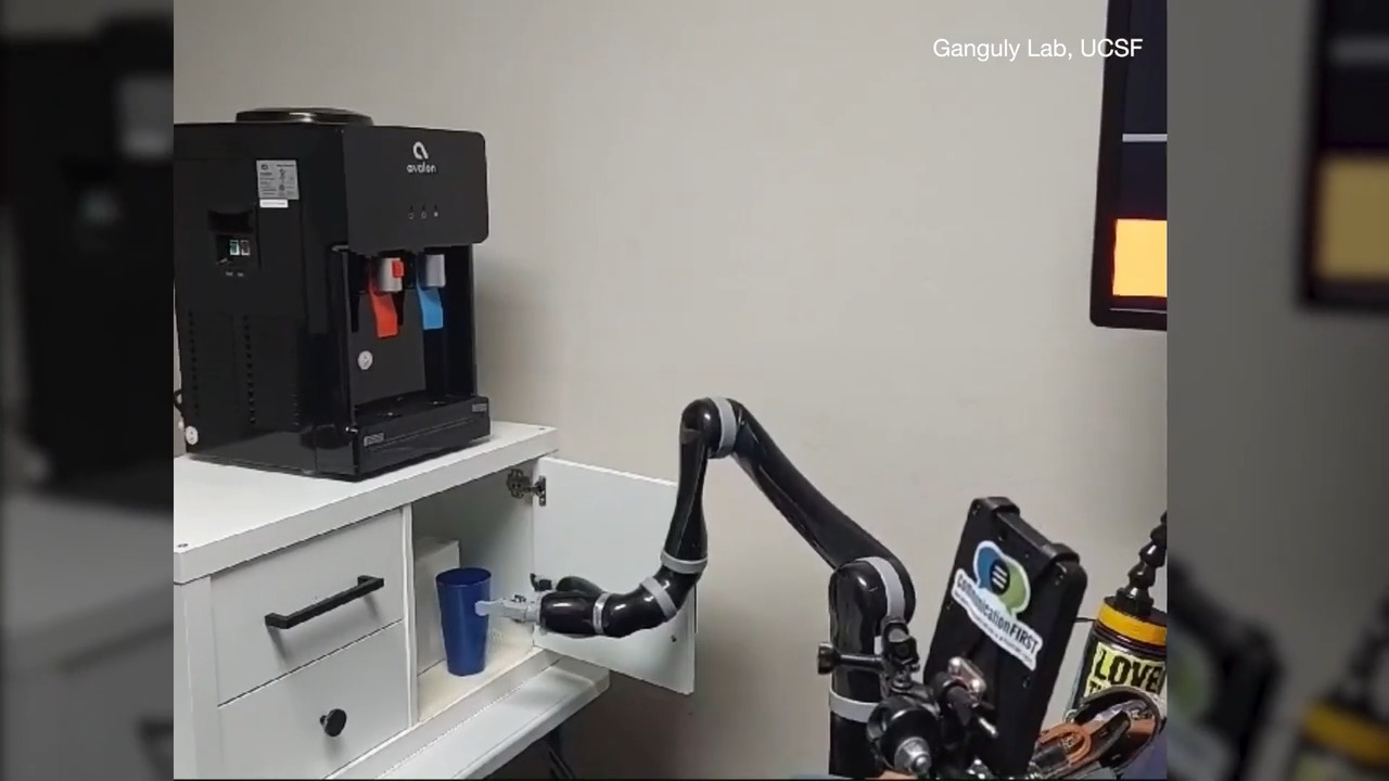 AI enables paralyzed man to control robotic arm with brain signals