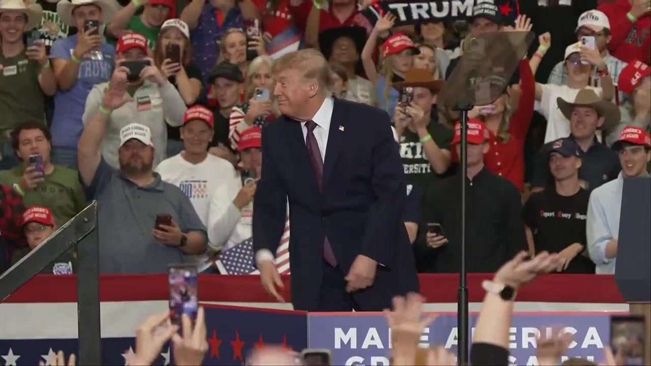 Trump arrives with hats for supporters at Ohio midterm rally