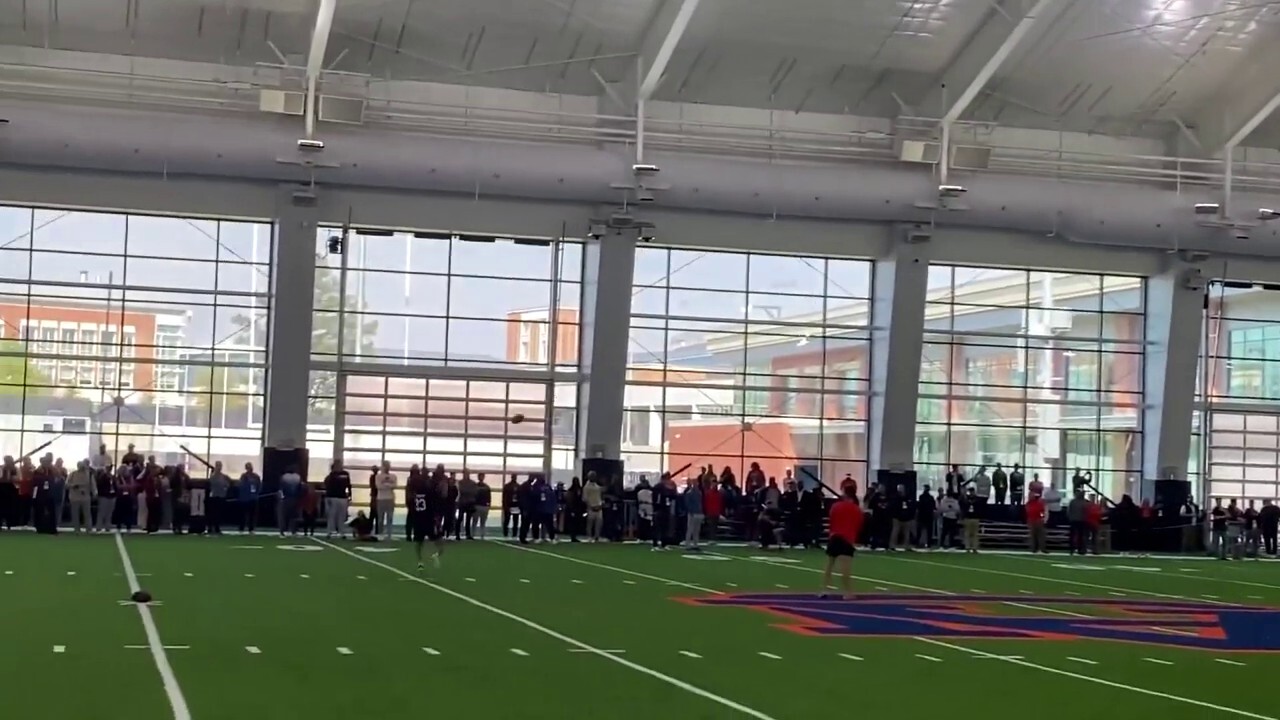 NFL star Cam Newton throws at Auburn's pro day