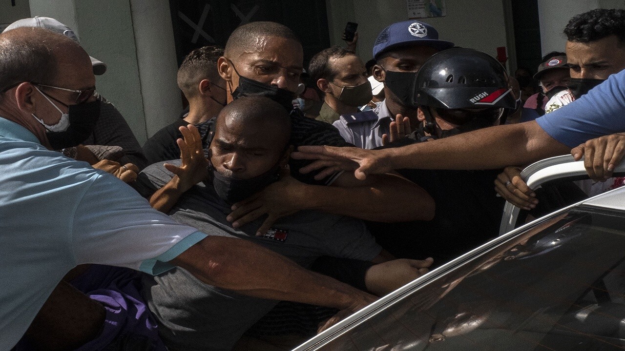 Cuban forces reportedly arrest dissidents as regime blames US for unrest 