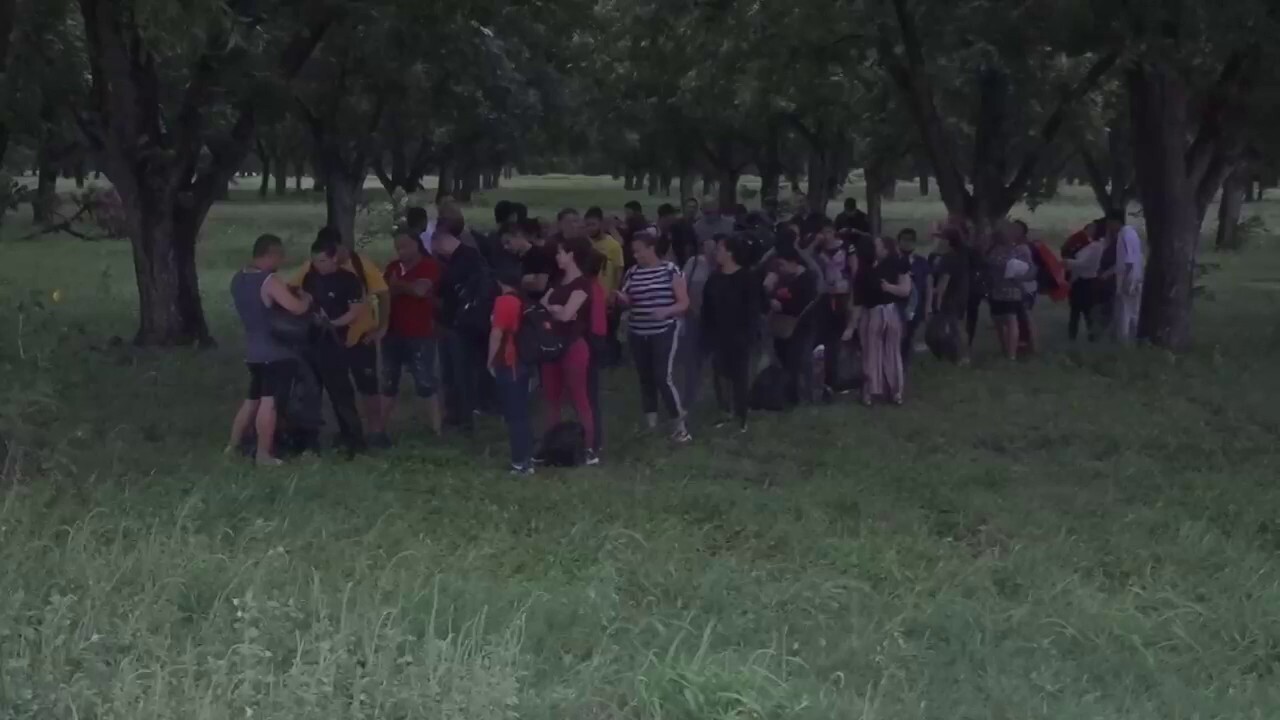 Migrants walking across the border tell Fox News where they are coming from