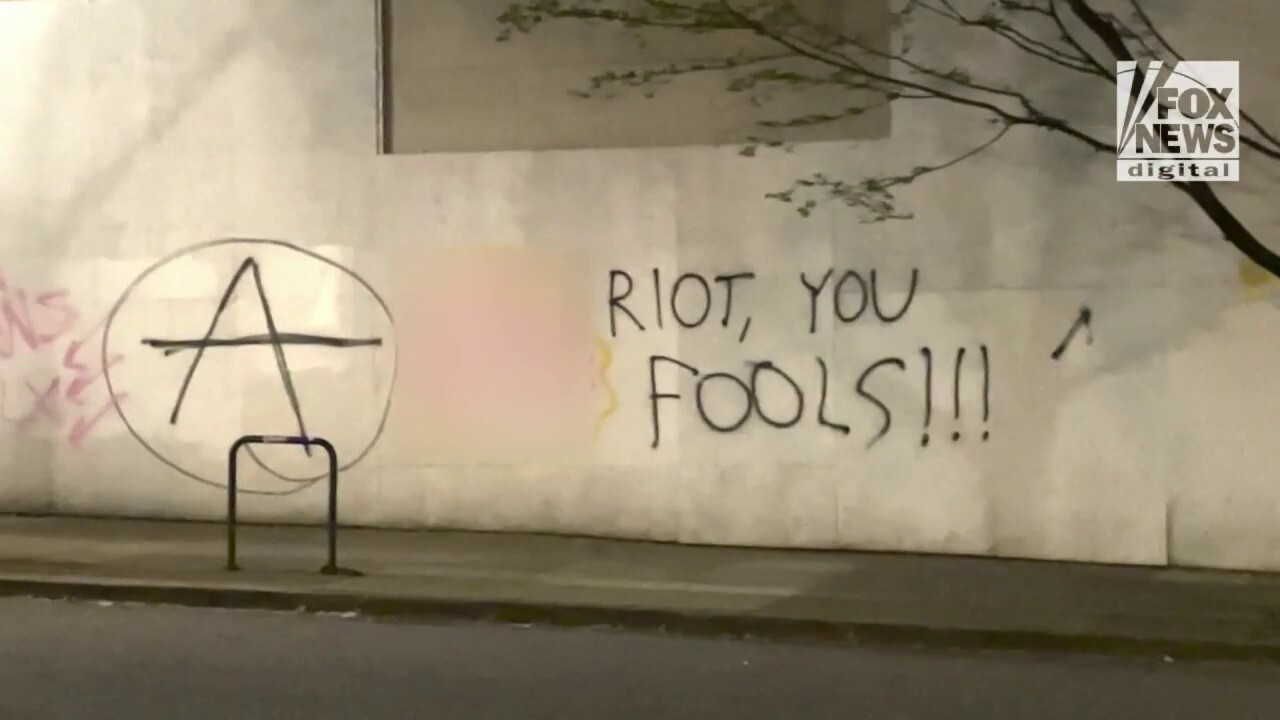 Portland footage of the graffiti and street damage following demonstrations by  pro-choice activists