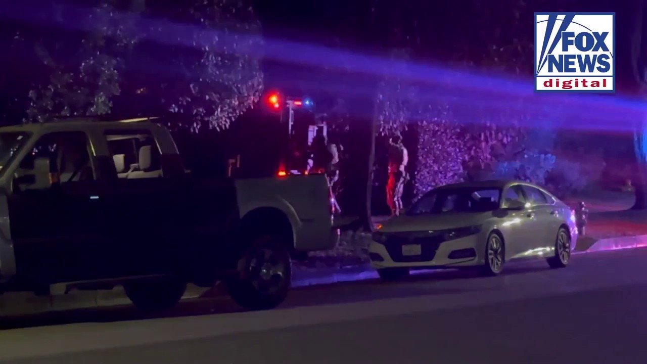 FBI agents raid mansion in Beverly Hills