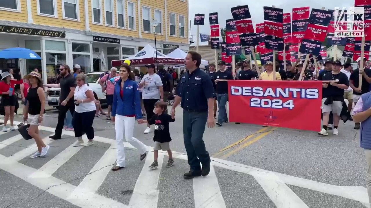 Gov. Ron DeSantis marching during the Independence Day parade in New Hampshire