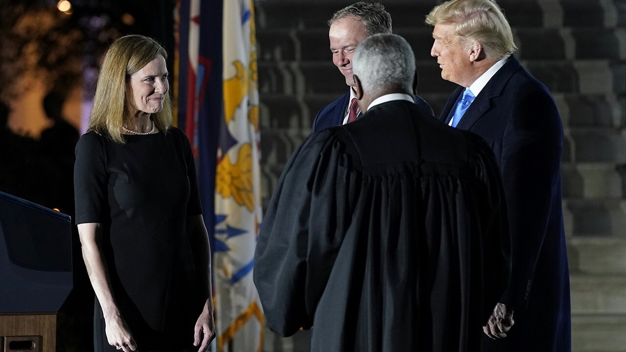 Justice Clarence Thomas administers constitutional oath to ACB
