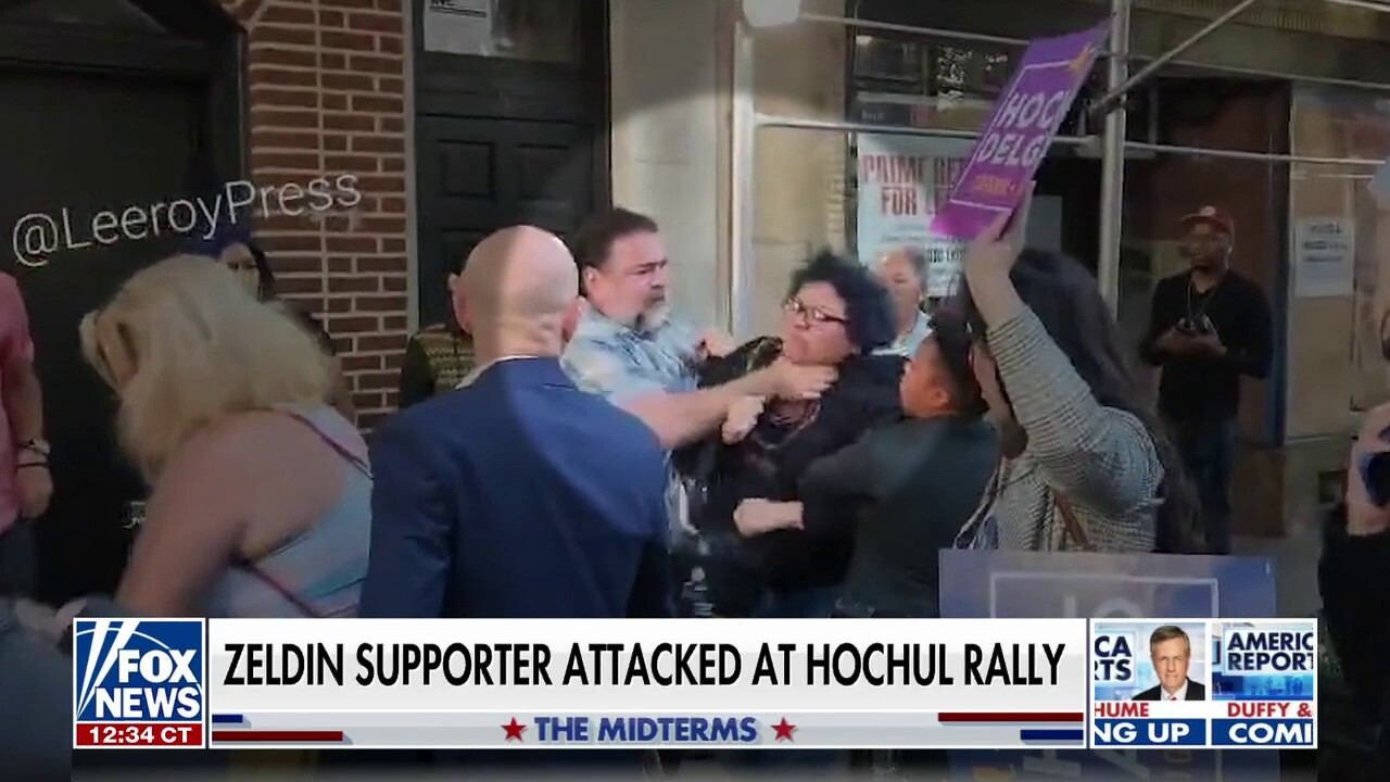 NYC police claim man seen on video choking Zeldin supporter was helping her