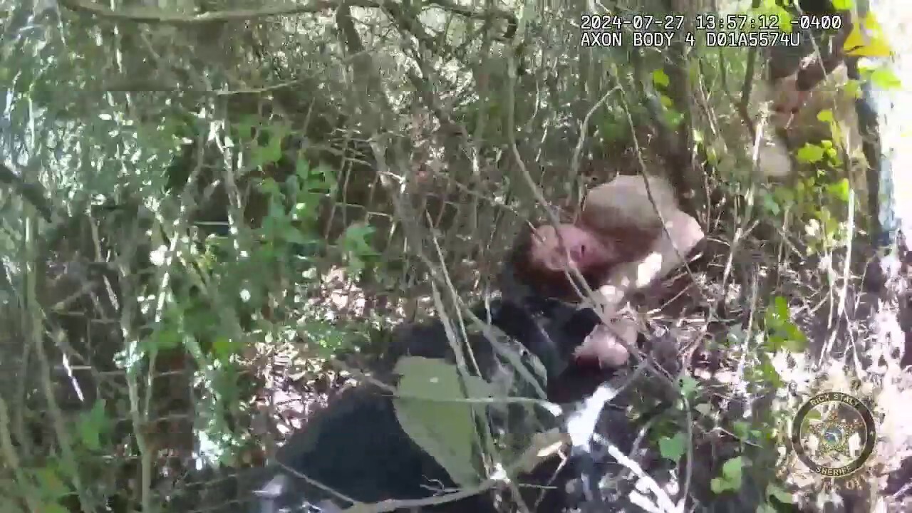 Escaped Florida inmate who faked injury found hiding in bushes