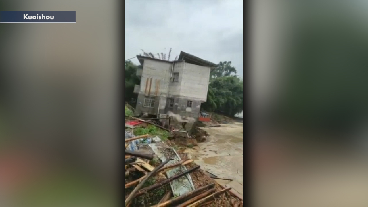 House crashes into river after heavy flooding in China