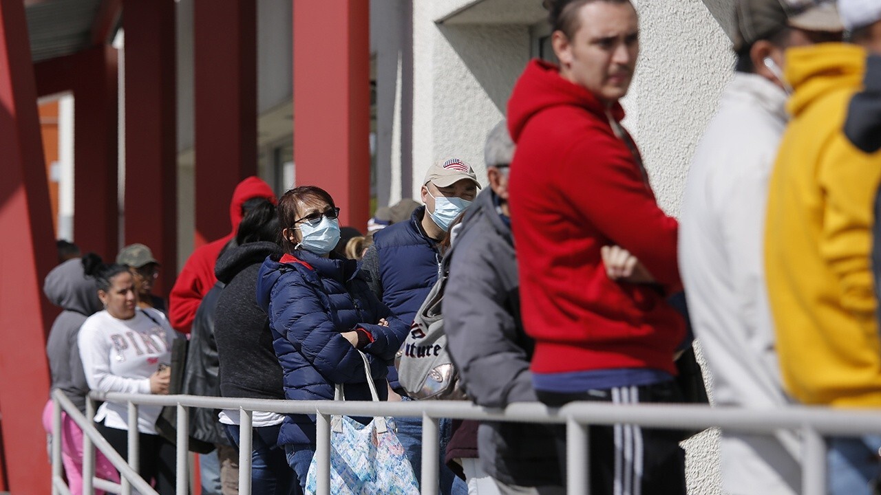 Unemployment claims spike to record 3.28 million as coronavirus hits economy 