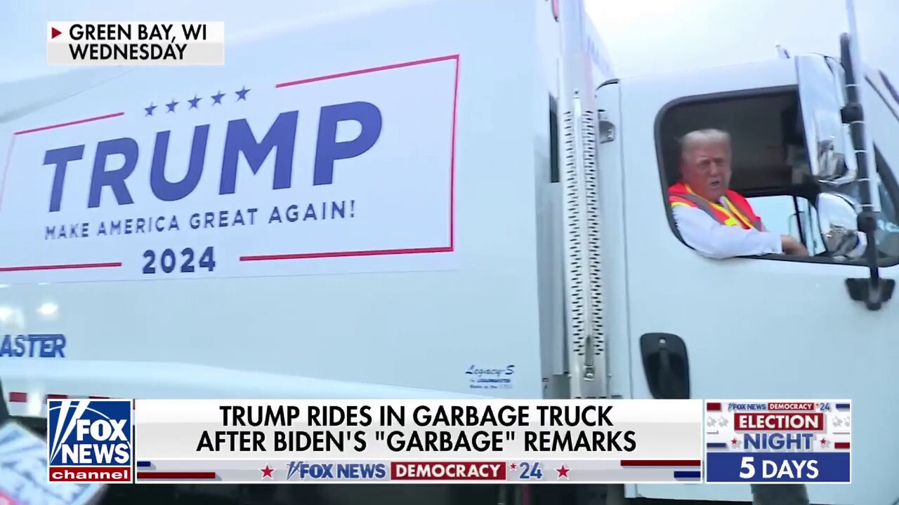 Trump appears in a garbage truck in Wisconsin following Biden's 'garbage' remarks