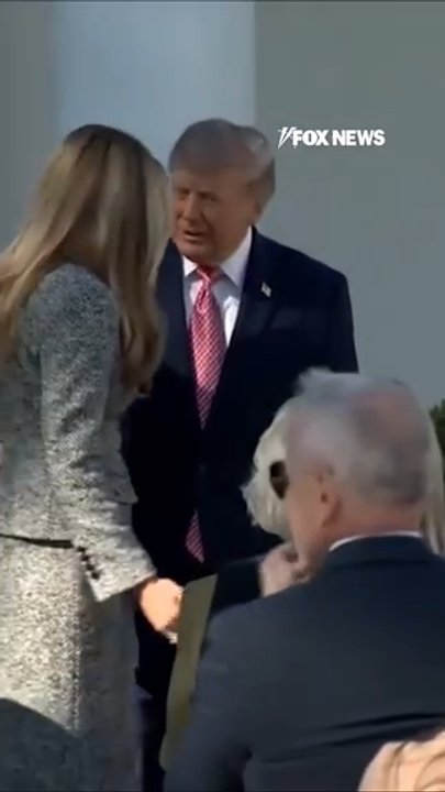 Trump pulls out chair for Melania at White House event