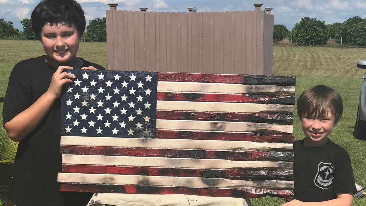 Father and sons build American flags for veterans and police officers