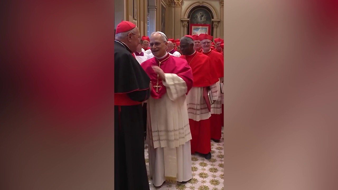 Pope Leo XIV is escorted out of Sistine Chapel after becoming 267th Pope